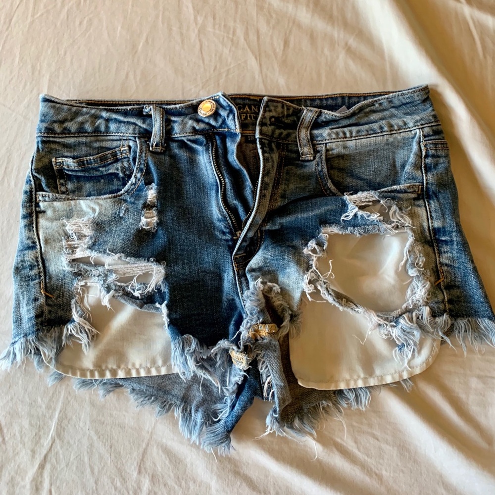 Denim ripped shorts.